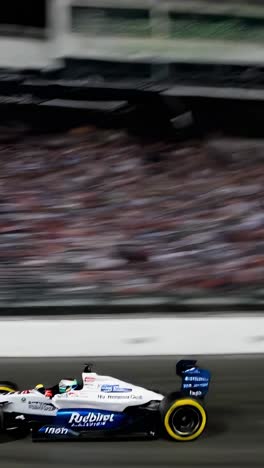 sparks flying from the underside of a formula one car racing on a circuit at night, creating a dazzling display of lights and speed, capturing the thrill of motorsport action
