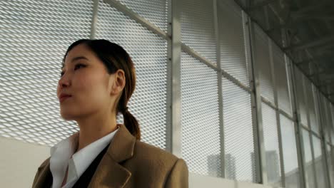 businesswoman walking in urban setting