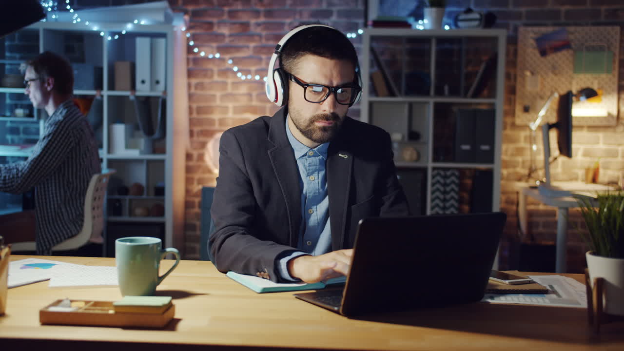 Businessman working late at night in an office