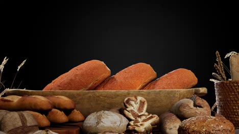different types of fresh bread on table, black background