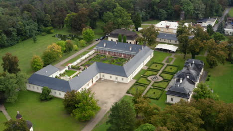 beautifully manicured gardens at the private wedding venue, chateau bon repos, aerial rise and reveal