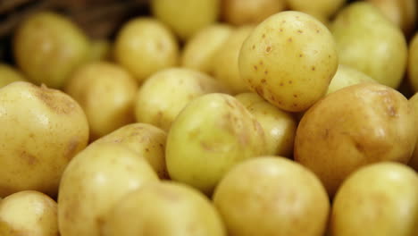 close-up of raw potatoes in basket