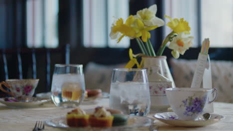 panning shot of an exquisite table setting at a classic tea party