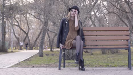 woman sitting on a park bench