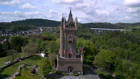 Aerial footage of the historical Wilhelmsturm of Dillenburg town in germany, bird&#039;s eye view
