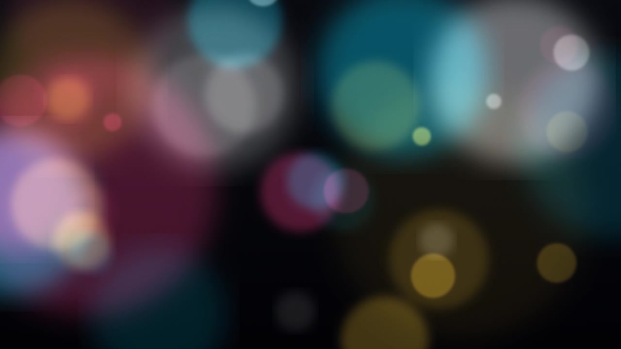 Sfondo astratto con sfere di luce bokeh morbide e colorate
