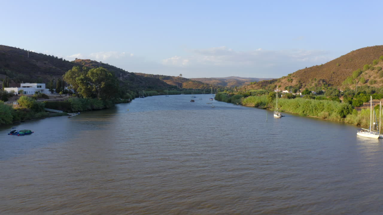 Guadiana River Border Landscape, Hills and Boats Moored in Southern Europe