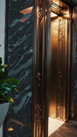 ornate bronze art deco elevator doors in a luxurious setting