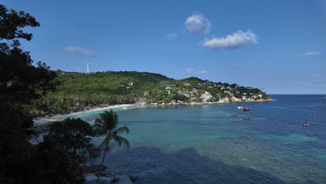 beautiful vantage view overlooking the beach, sea, island, and boats in koh tao, thailand