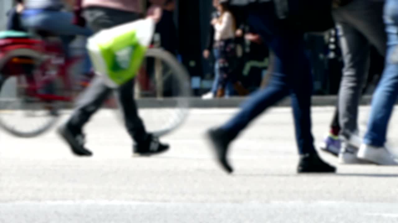 Side view blurry pedestrians walking.Time Lapse.