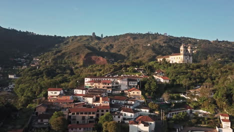 aerial shot of ouro preto historical city and cathedral in brazil