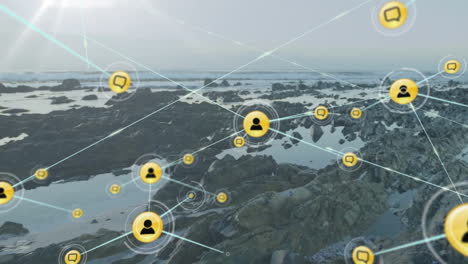 Animation-of-network-of-connections-with-icons-over-landscape