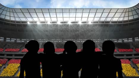 animation of silhouettes of team of sports women with german flag over sports stadium