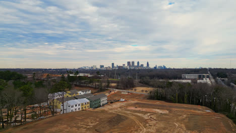 condominium construction with the view of downtown atlanta skyline buildings in background, ga, usa