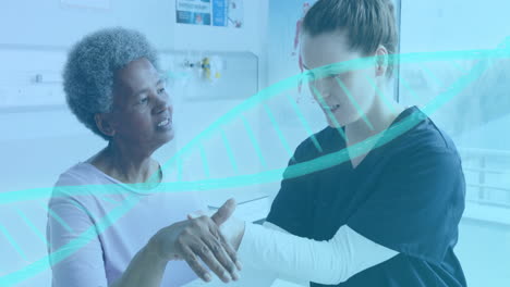 animación de cadena de adn sobre diversas mujeres médico y paciente en el hospital