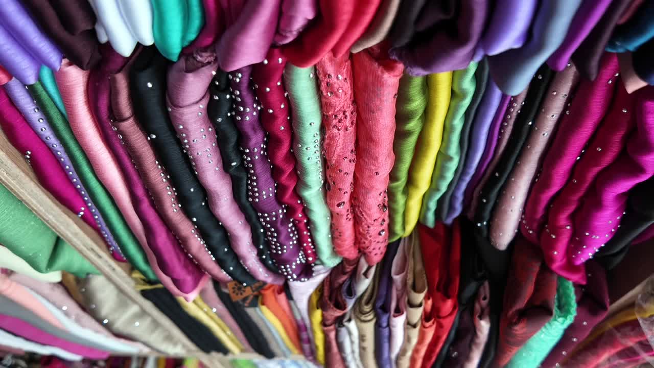 Vibrant Collection of Colorful Fabrics and Scarves