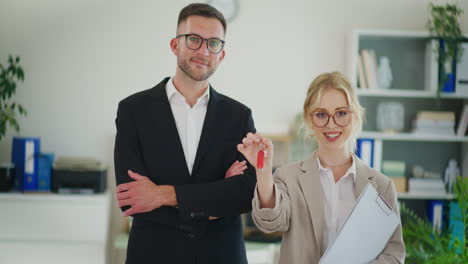 confident real estate agents in office