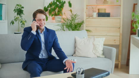businessman receives positive news