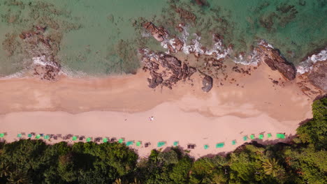 aerial view of a tropical beach with tourists