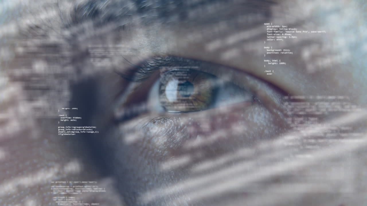 Animation of data processing over close up of man's eye
