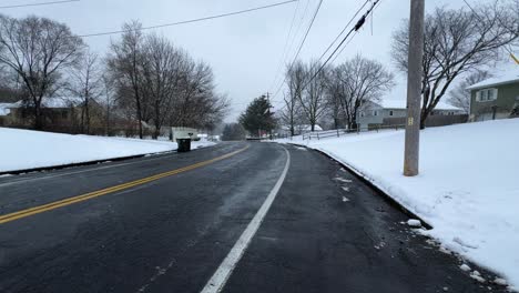 slow motion video of a snowy nor’easter in the suburbs of new york city, on a winter's day