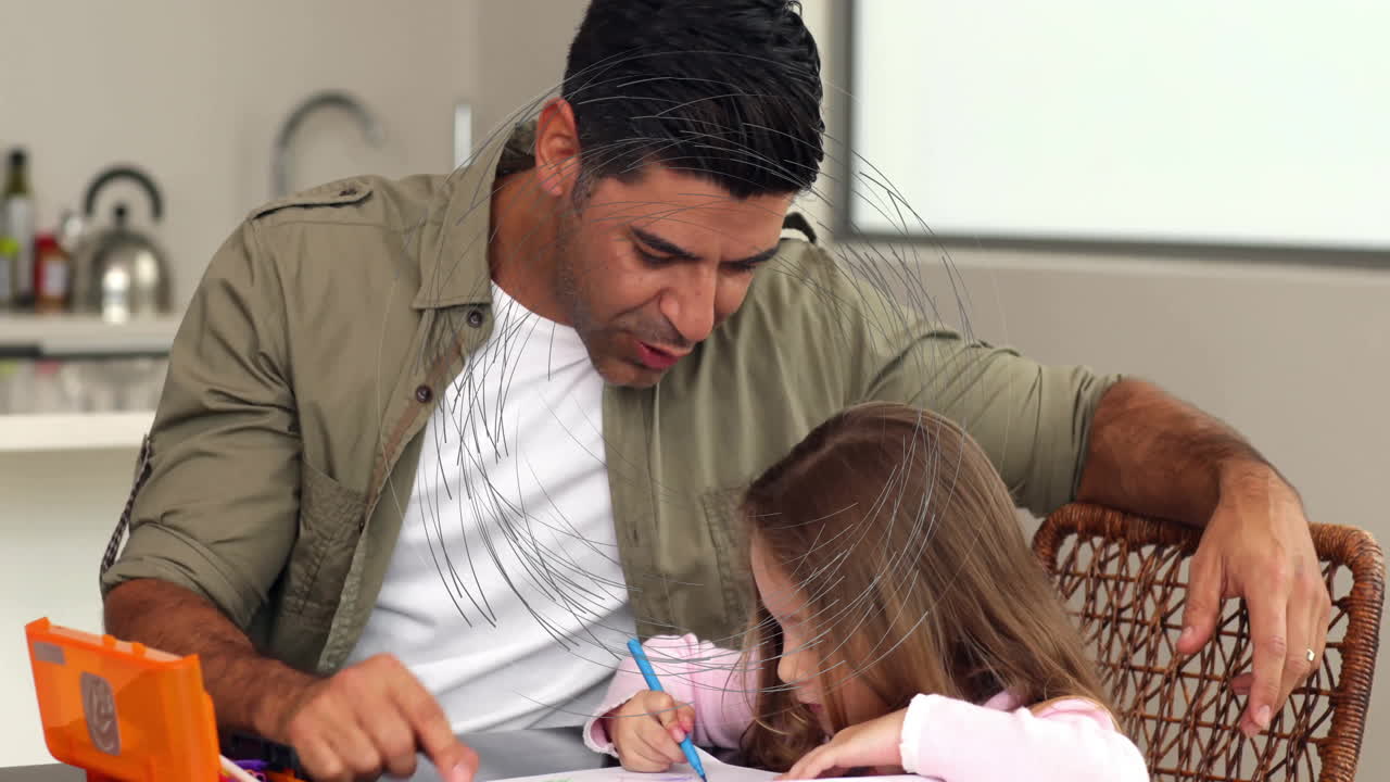 Father and daughter drawing together, animation of circular lines over them
