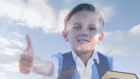 animation of clouds over caucasian boy holding books