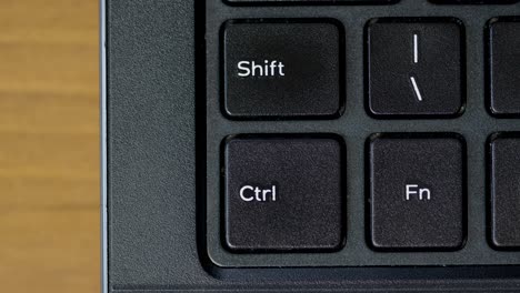 Finger-Pressing-Ctrl-Keyboard-Button-Top-View