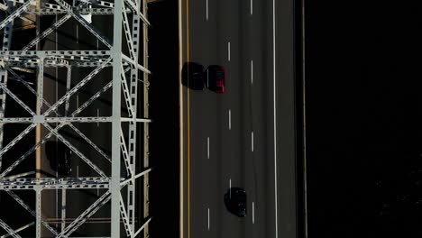 Burlington-Bay-James-N-Allan-Skyway-top-view-closeup-overlooking-empty-lot-inland-waters-Eastport-Drive-Lakeshore-Road-summer-day-parallel-to-paved-overpass-and-old-silver-vintage-steel-bridge