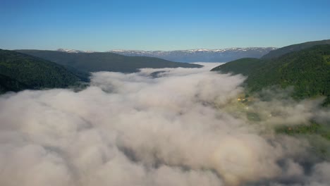 aerial footage beautiful nature norway over the clouds.