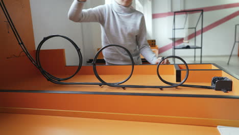 boy conducts research experience. museum of entertaining sciences