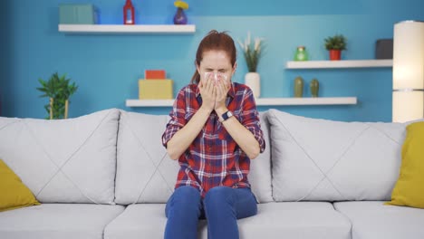 Young-woman-covering-mouth-and-nose-while-sneezing.