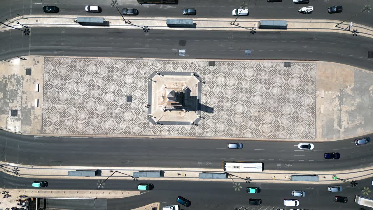 Aerial view descending at Restauradores Square where we can apreciate the beautiful Portuguese sidewalk. Lisbon,Portugal