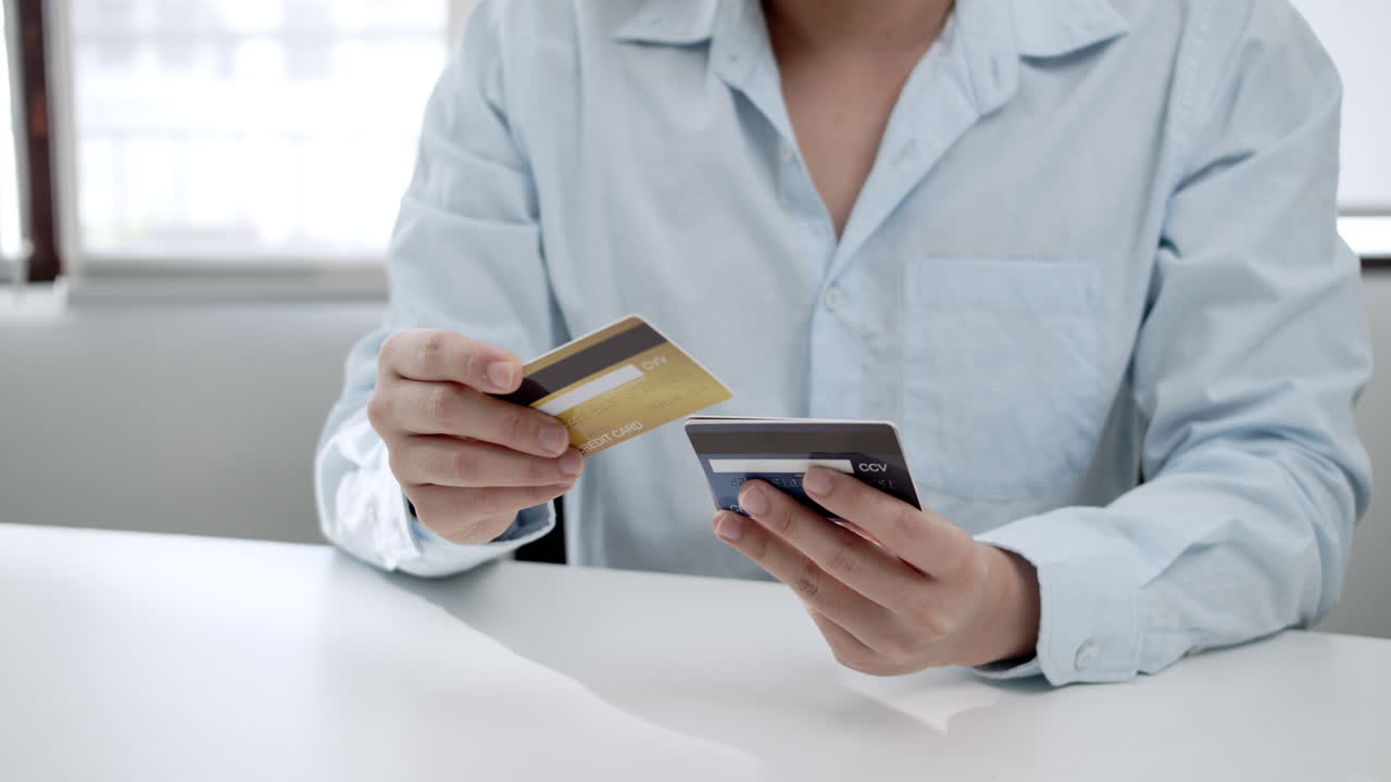 Close-up shot of a woman browsing and choosing a credit for a transaction.