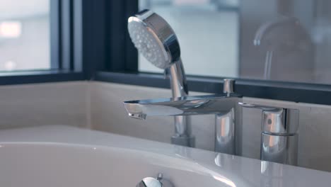 pov to the water flow out into the bathtub surface relaxation spa time