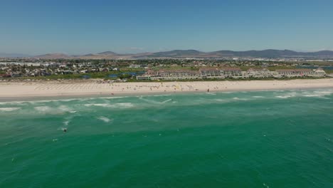 a kitesurf event in front of dolphin beach near cape town, aerial shot