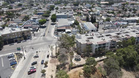 aerial drone view following a ambulance, driving in the neighborhoods of los angeles