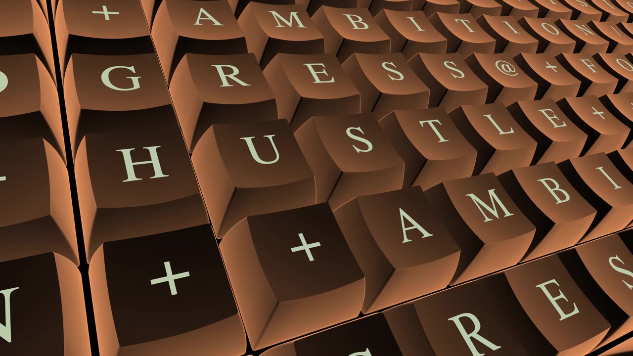 A metallic keyboard animation featuring motivational business terms engraved on keys to symbolise career growth, success, and strategic vision.