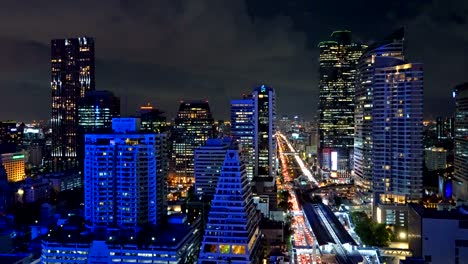 smart city. financial district and skyscraper buildings. aerial view of bangkok downtown area at night, thailand.