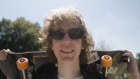 caucasian boy in skatepark.