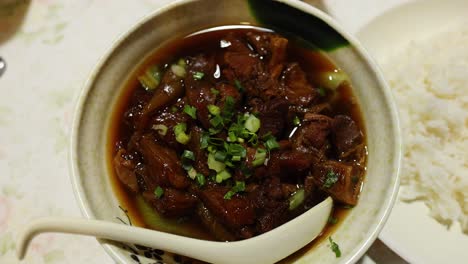 savoring a flavorful beef and vegetable dish