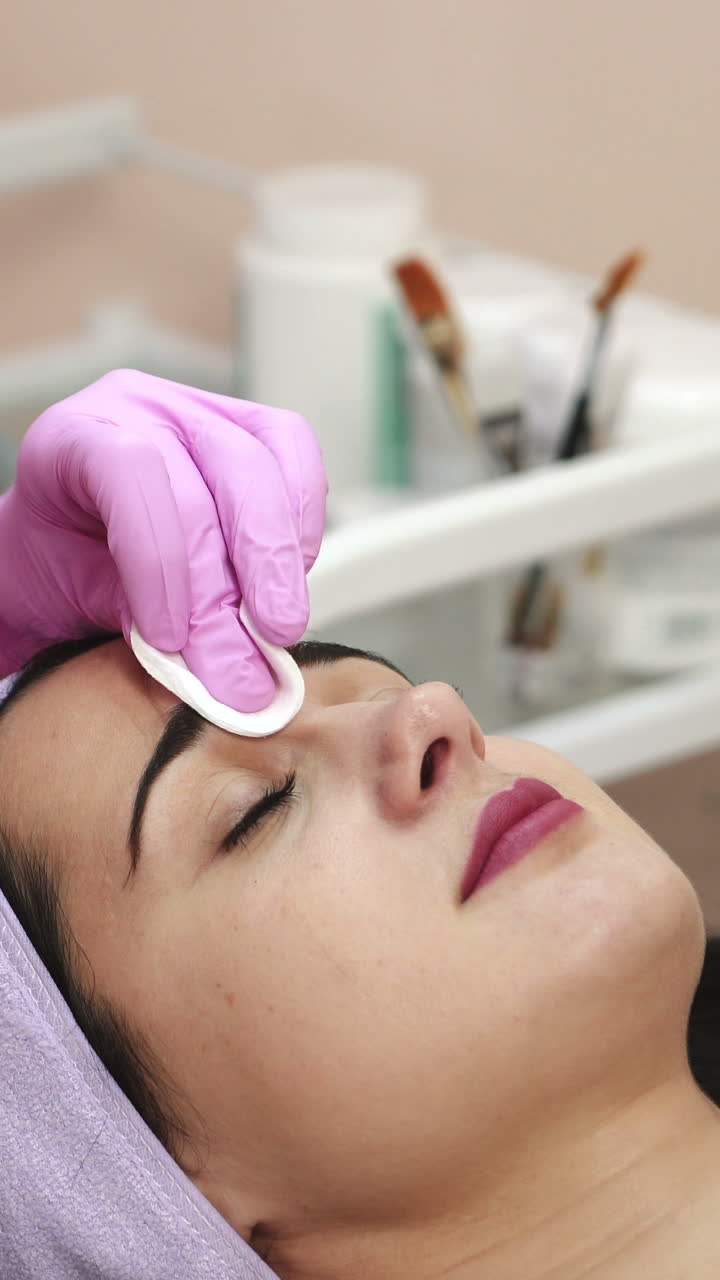 Rejuvenating facial injections. Vertical video