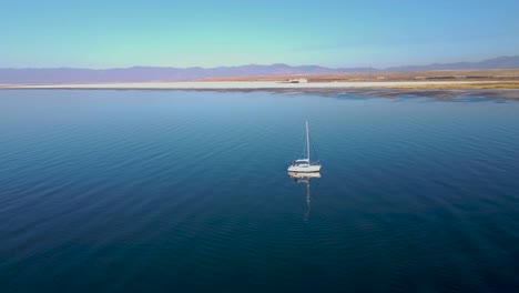 solo yacht in the great salt lake, utah, beautiful blue water, aerial view