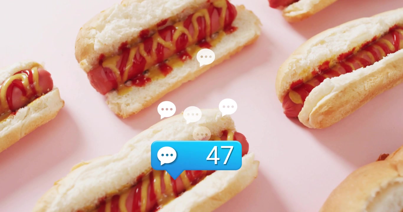 Una bolla di chat blu che compare, un hot dog centrale che aumenta di popolarità, bolle bianche che salgono, mostrando il fermento sociale.