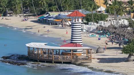 tropical beach resort with lighthouse