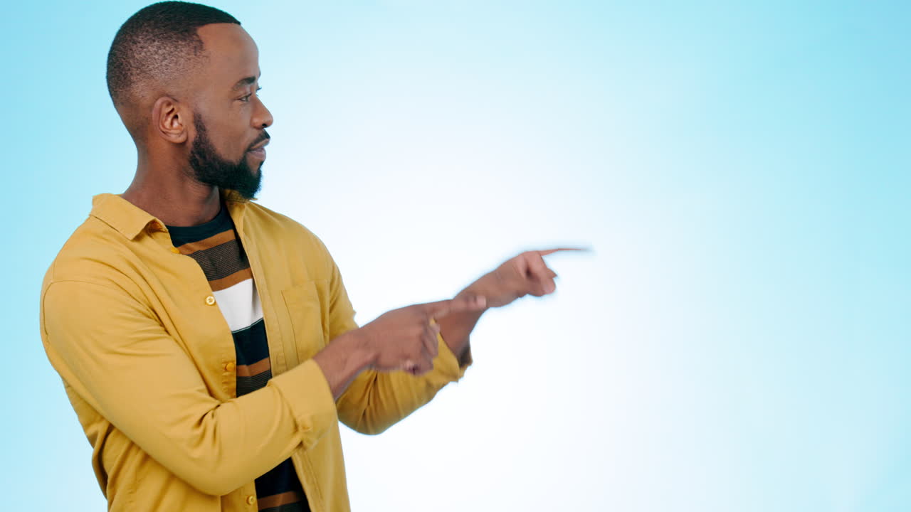 Pointing, dance and face of black man on blue