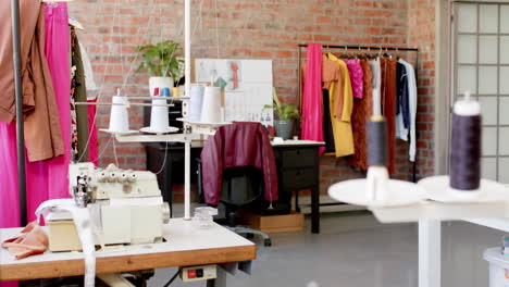 interior of bright fashion studio, slow motion