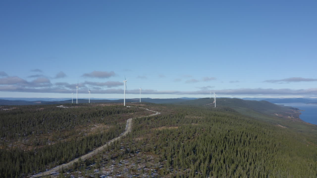Beautiful Landscape By The Windmills Of Osen, Norway Under A Bright Sunny Day - Aerial Distant Shot