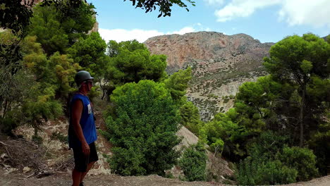 Man-tourist-walking-in-nature-trek-forest-landscape-Gibraltar-national-park