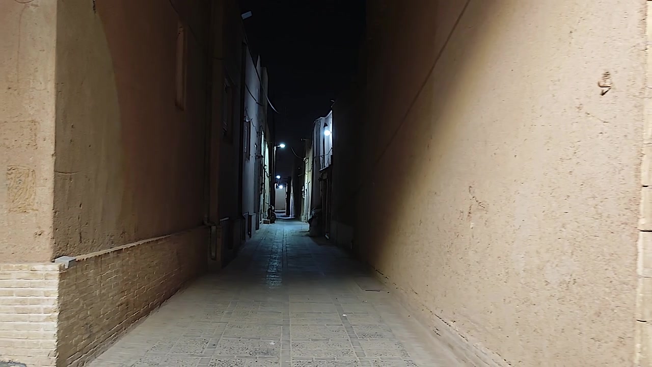 Narrow Alleyway in an Ancient City at Night
